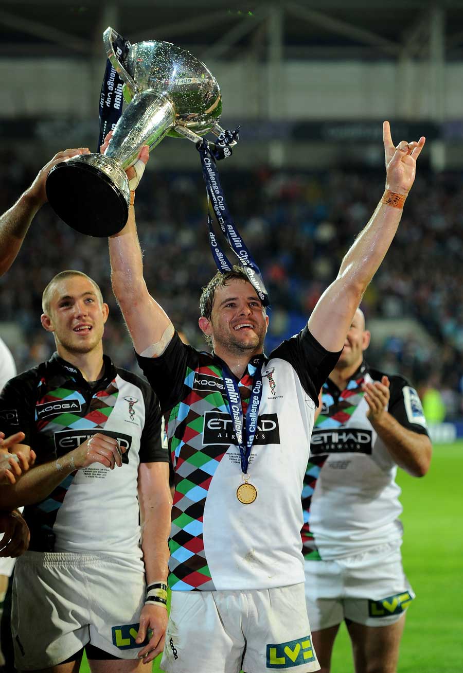 Quins fly-half Nick Evans salutes his side's fans