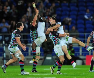 Harlequins celebrate at the final whistle