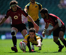 Australia's Zack Holmes stretches for a loose ball