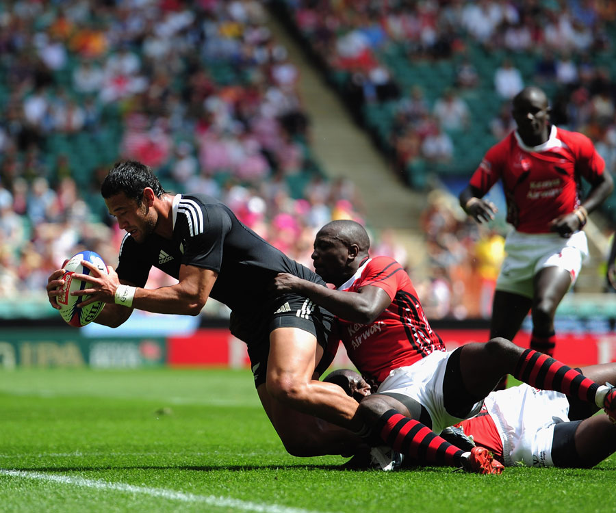 New Zealand's Tomasi Cama forces his way over the line against Kenya