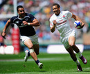 England's Dan Norton runs in one of three tries against the USA
