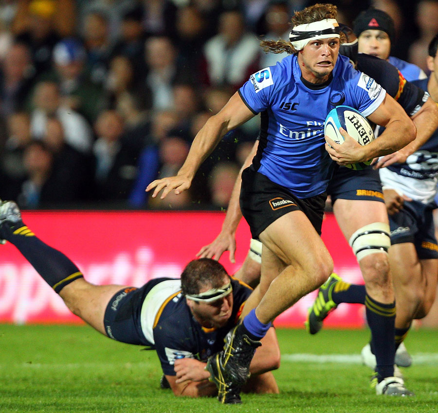 Western Forces' Nick Cummins breaches the Brumbies defence