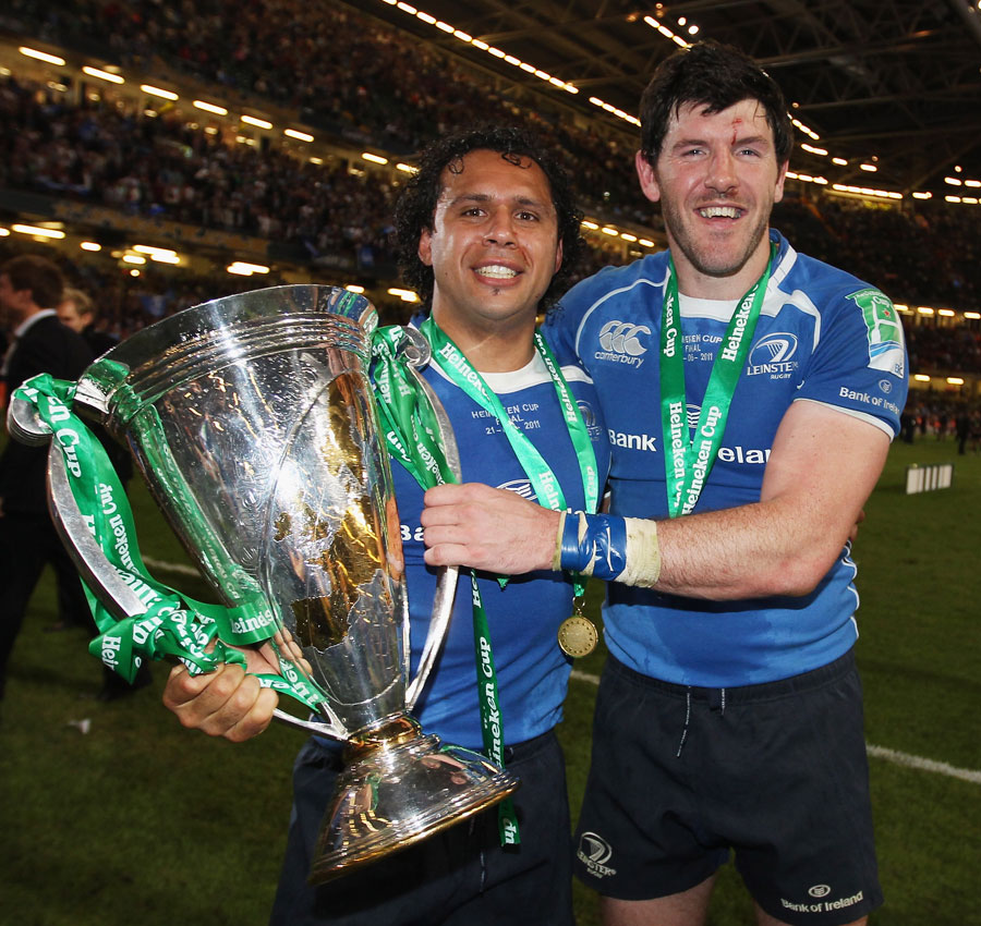 Leinster's Isa Nacewa and Shane Horgan raise the Heineken Cup trophy