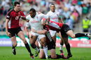 England's Steffon Armitage charges into the Canada defence