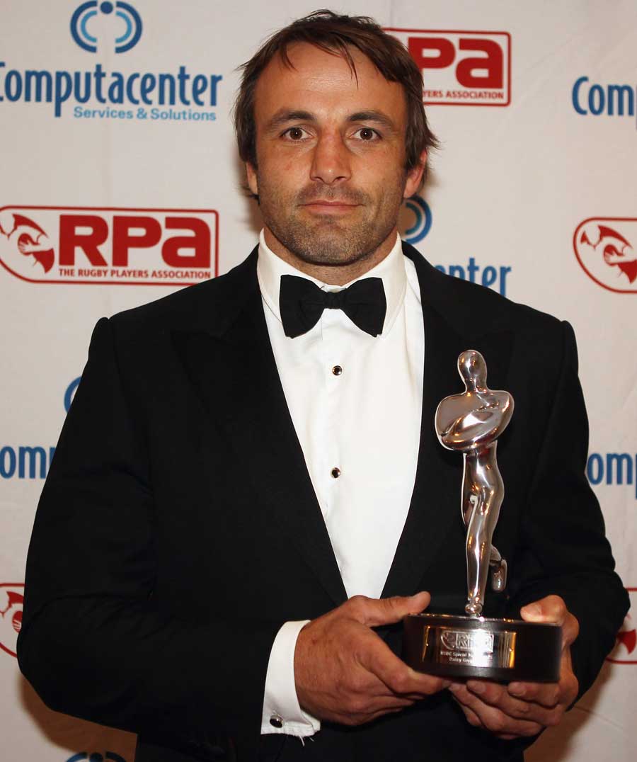 Danny Grewcock  poses with the RPA's Special Merit Award
