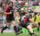 Leicester's Tom Croft charges at the Saracens defence