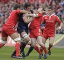 Leinster's Nathan Hines charges into the Munster defence