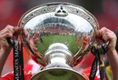 Munster's Keith Earls drinks from the Magners League trophy