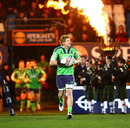 Highlanders flanker Adam Thomson leads his side out