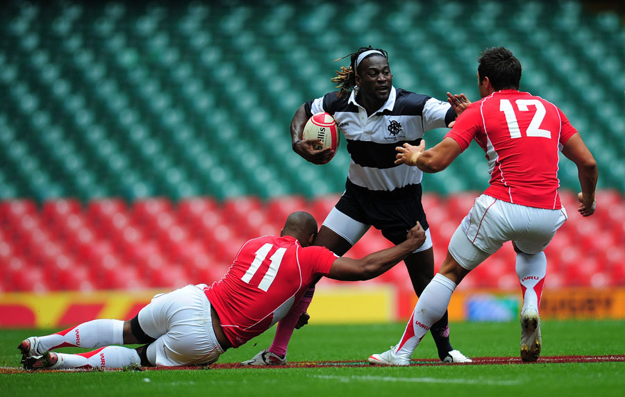 Barbarians wing Paul Sackey takes on the Wales defence