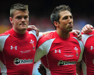 The recalled Gavin Henson (r) lines up for the Welsh national anthem, Wales v Barbarians, Millennium Stadium, Cardiff, Wales, June 4, 2011