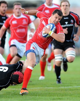 Russia's Vasily Artemyev charges through a tackle, Canada v Russia, Churchill Cup, The Rugby Ground, Esher, England, June 8, 2011