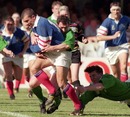 France's Jean-Luc Sadourny takes on the Ireland defence