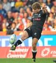 The Sharks' Patrick Lambie puts boot to ball