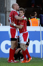 Russia fullback Igor Klyuchnikov is congratulated after his try