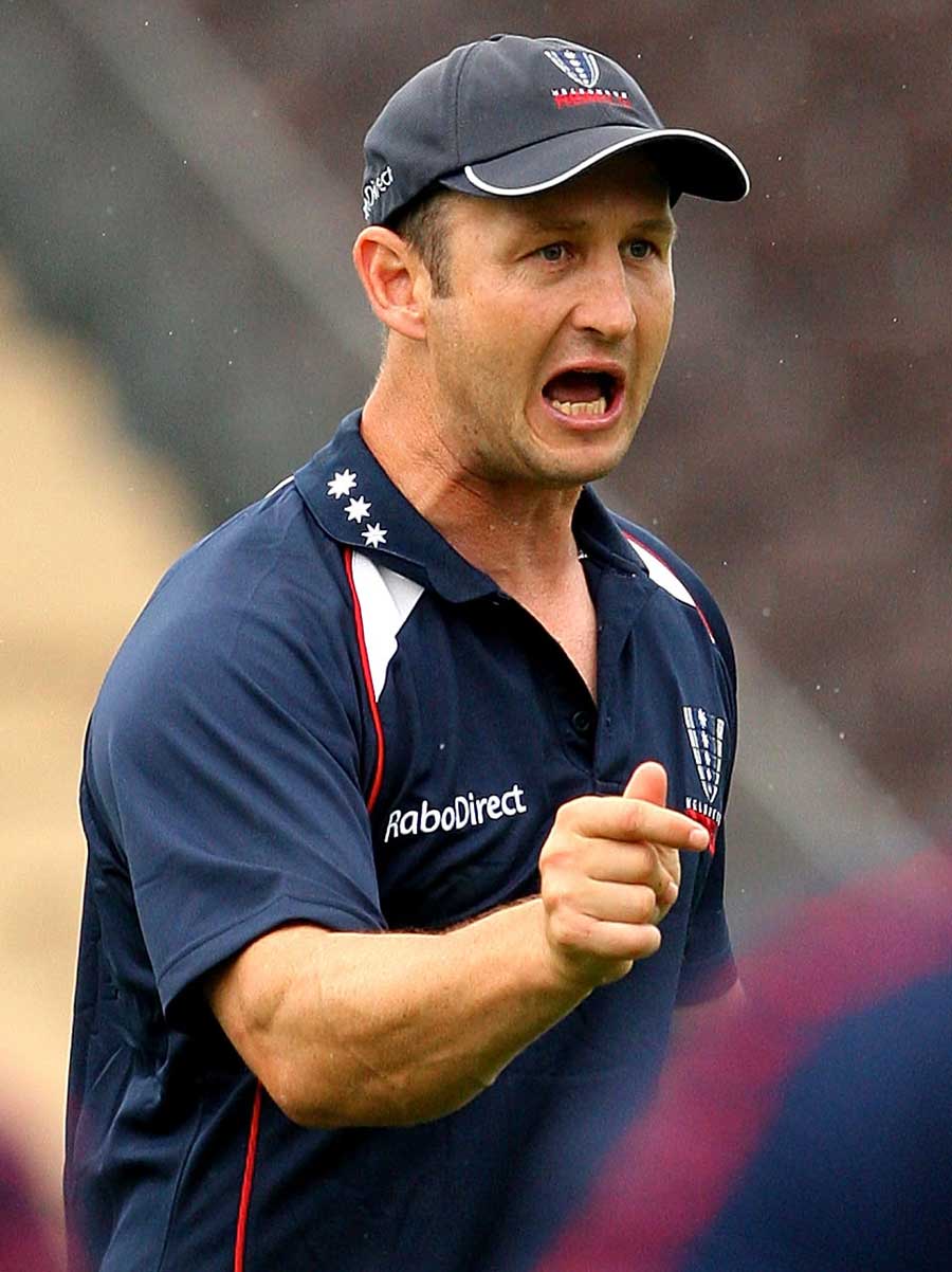 Melbourne Rebels assistant coach Damien Hill offers some instruction
