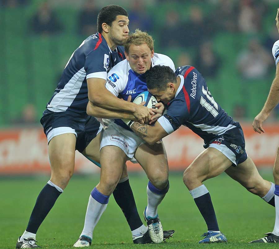 The Rebels gang up on the Western Force's Brett Sheehan