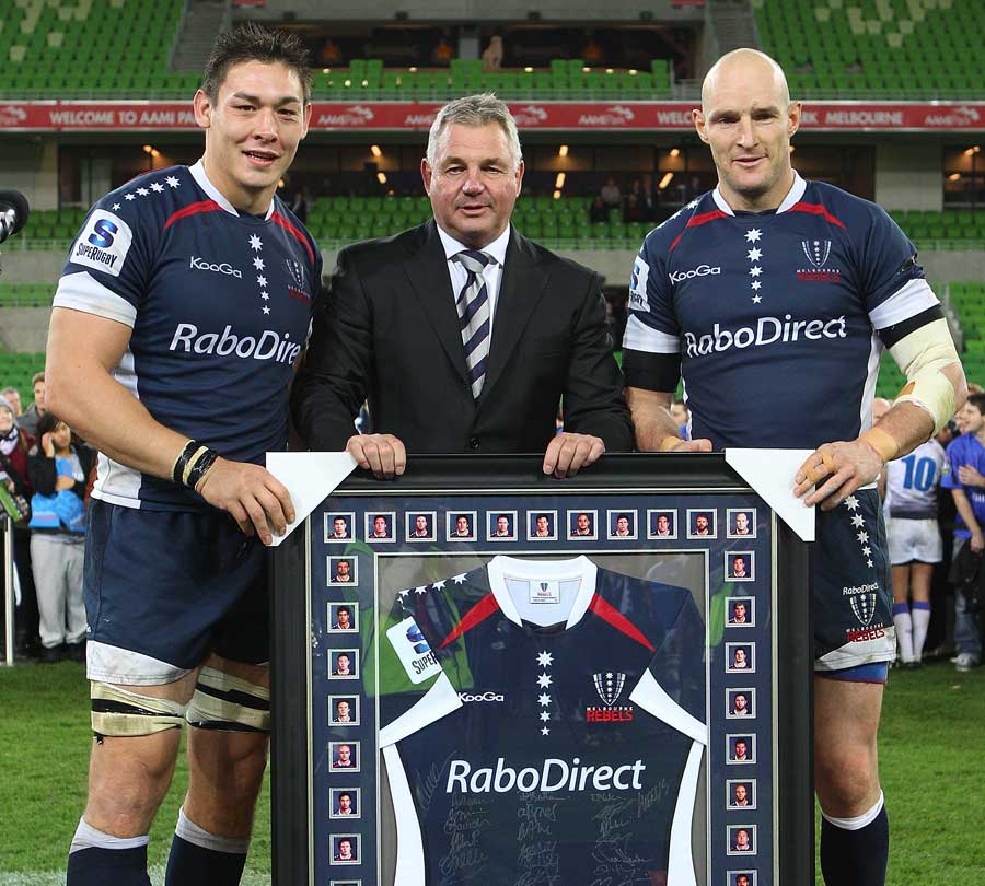 The Rebels' Gareth Delve, Rod Macqueen and Stirling Mortlock pose following their final game of the season