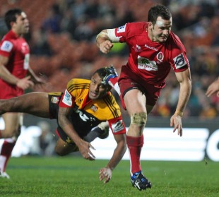 The Reds'  Jono Lance breaches the Chiefs' defence, Chiefs v Reds, Super Rugby, Waikato Stadium, Hamilton, New Zealand, June 18, 2011