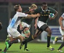 South Africa's Wandile Mjekevu breaches the England defence