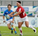 Wales' Rheon James feeds his support