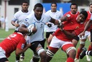 Fiji's Maikeli Modu spots a gap