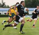 New Zealand's Francis Saili races in to score
