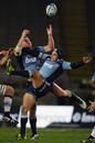 The Blues tussle for the ball against the Waratahs
