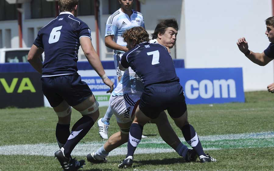 Argentina prop Ignacio Saenz tries to burst through a tackle