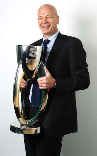 SANZAR chief executive Greg Peters poses with the Super Rugby silverware