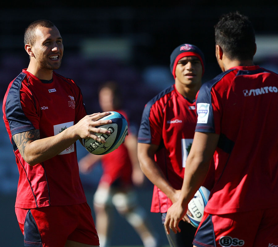 Quade Cooper and Digby Ioane share a laugh at Reds training