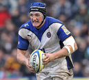 Bath's Stuart Hooper takes the attack to Quins