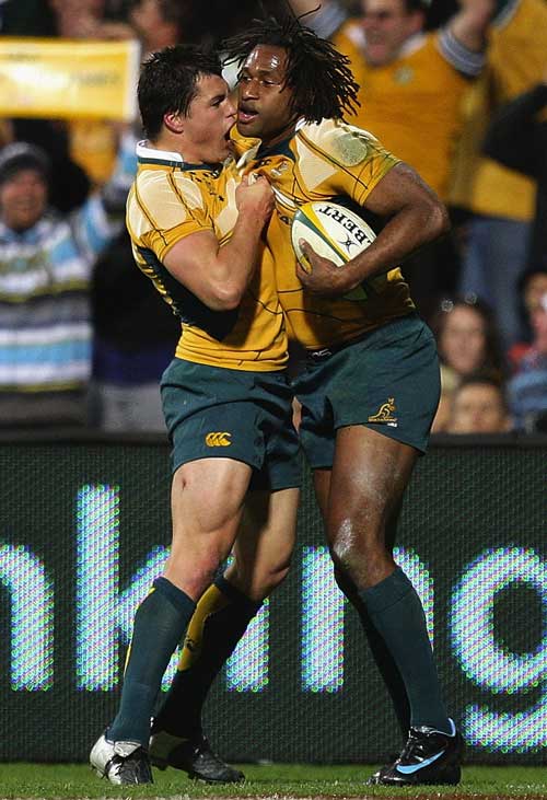Lote Tuqiri is congratulated by Adam Ashley-Cooper