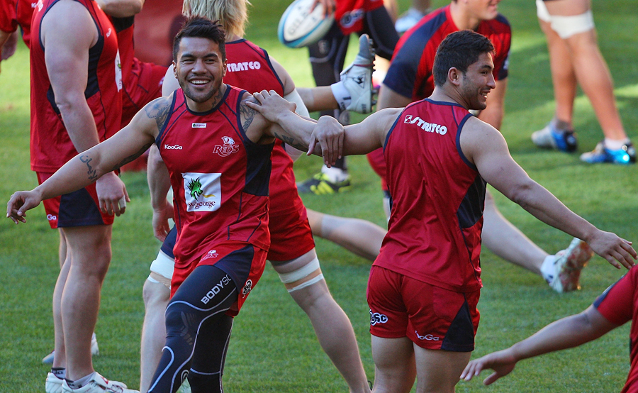 The Reds' Digby Ioane and Anthony Faingaa limber up for the Super Rugby Final