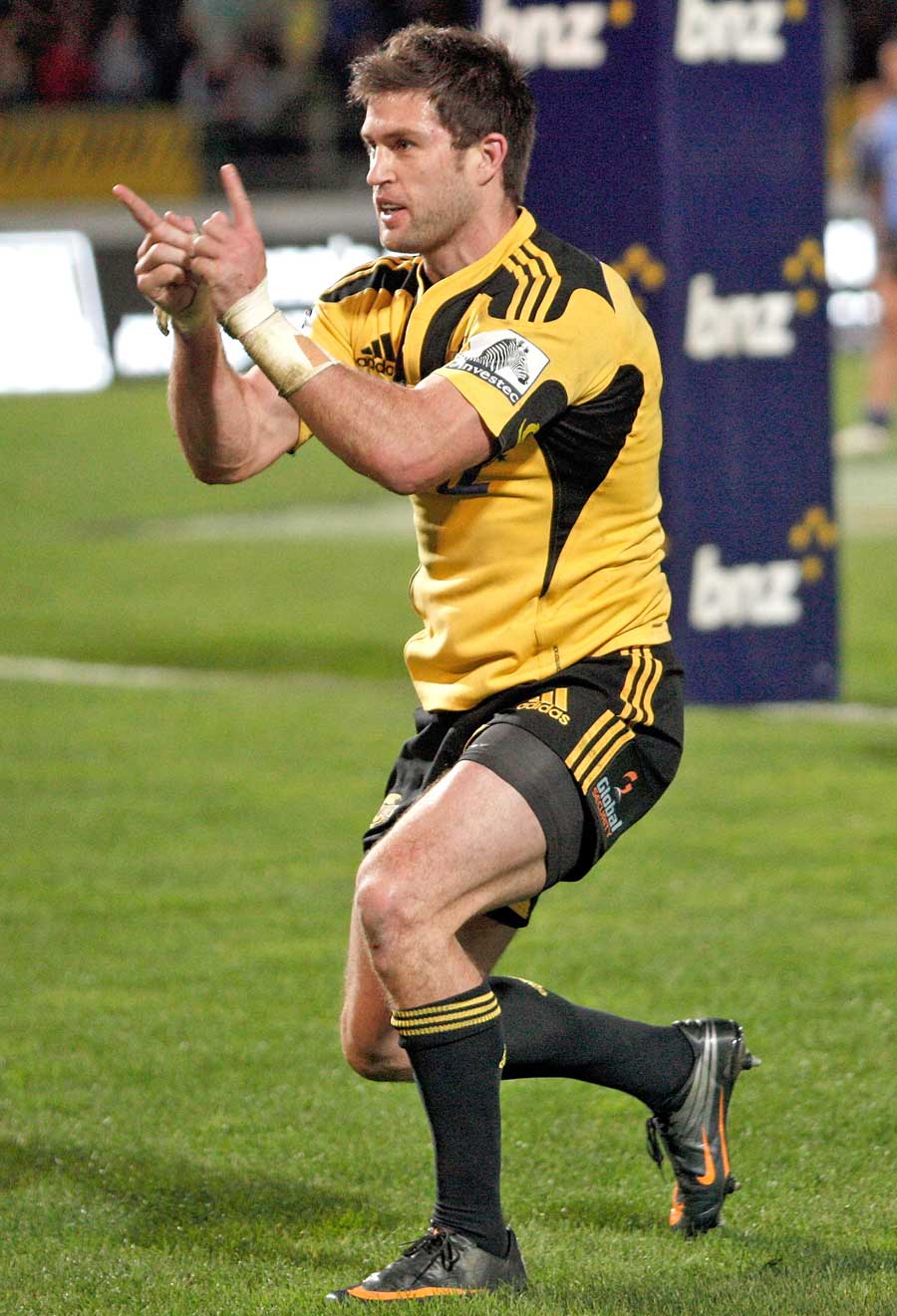 The Hurricanes' Cory Jane celebrates a try