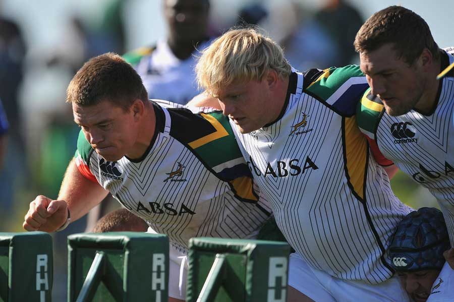 South Africa's John Smit focusses on the scrum machine
