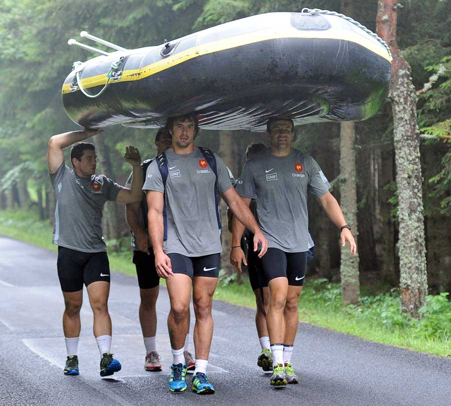 France's Guilhem Guirado, Julien Pierre and Damien Traille take part in a training trek