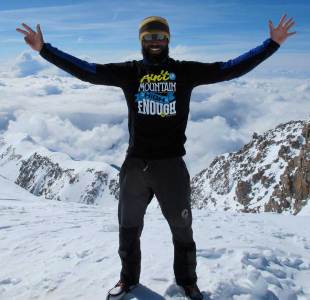 Richard Parks finishes his epic challenge by reaching the top of Mount Elbrus on Tuesday, Russia, July 12, 2011