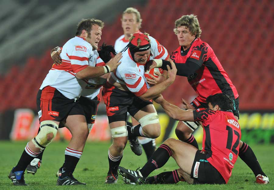 The Lions' Franco van der Merwe tries to force his way through