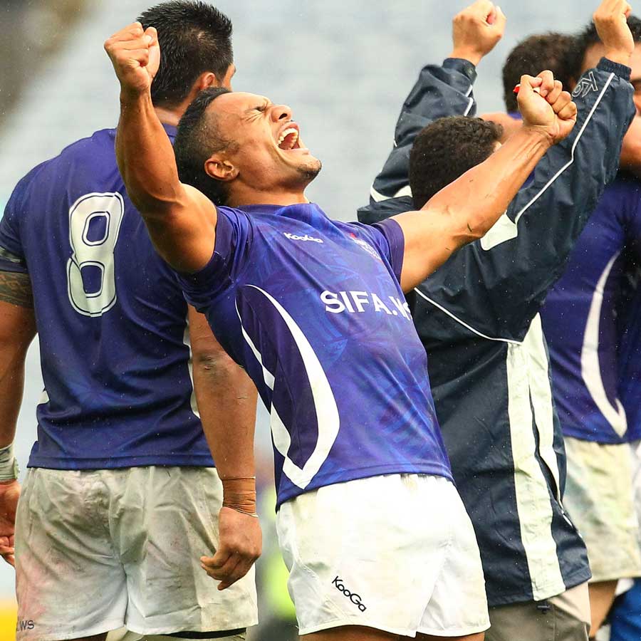 Samoa's Eliota Fuimaono-Sapolu celebrates his side's victory
