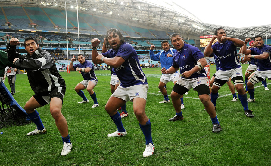 Samoa's players perform a second haka to celebrate their win