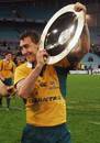 Australia's Mat Rogers celebrates with the Mandela Plate