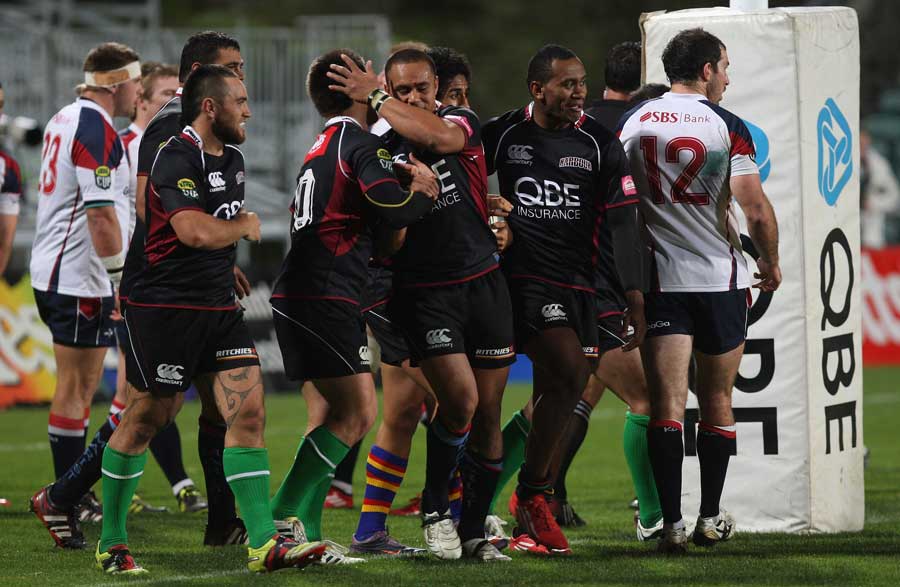 North Harbour celebrate a try against Tasman