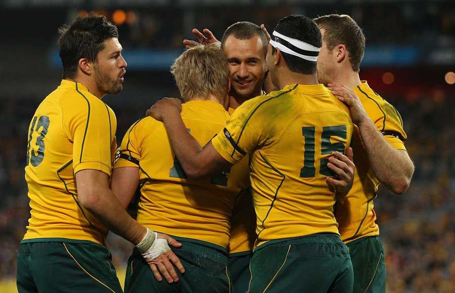 The Wallabies celebrate a try