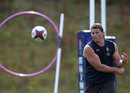Dylan Hartley hits the target during England training