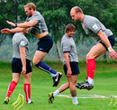 France forwards Romain Millo-Chluski and Julien Bonnaire jump to during training