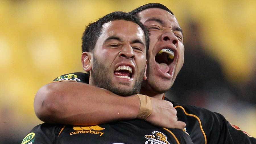 Wellington's Frae Wilson is hugged by Motu Matu'u after scoring a try during round four of the ITM Cup, Wellington v Canterbury, ITM Cup, Westpac Stadium, Wellington, July 27, 2011