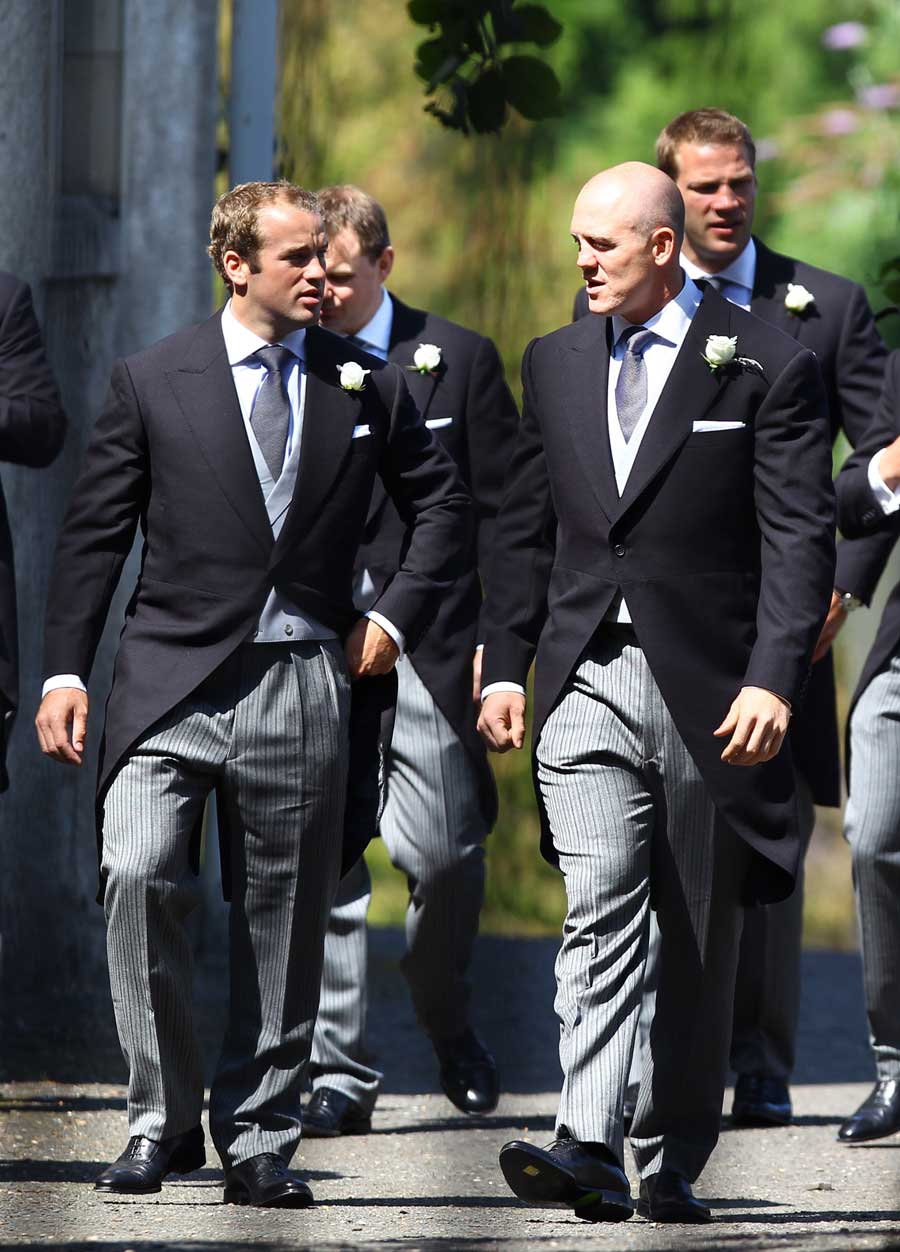 Groom Mike Tindall (r) chats to James Simpson-Daniel (l) prior to his wedding to Zara Phillips