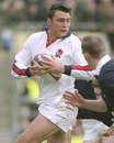 England's Ben Clarke braces for a tackle