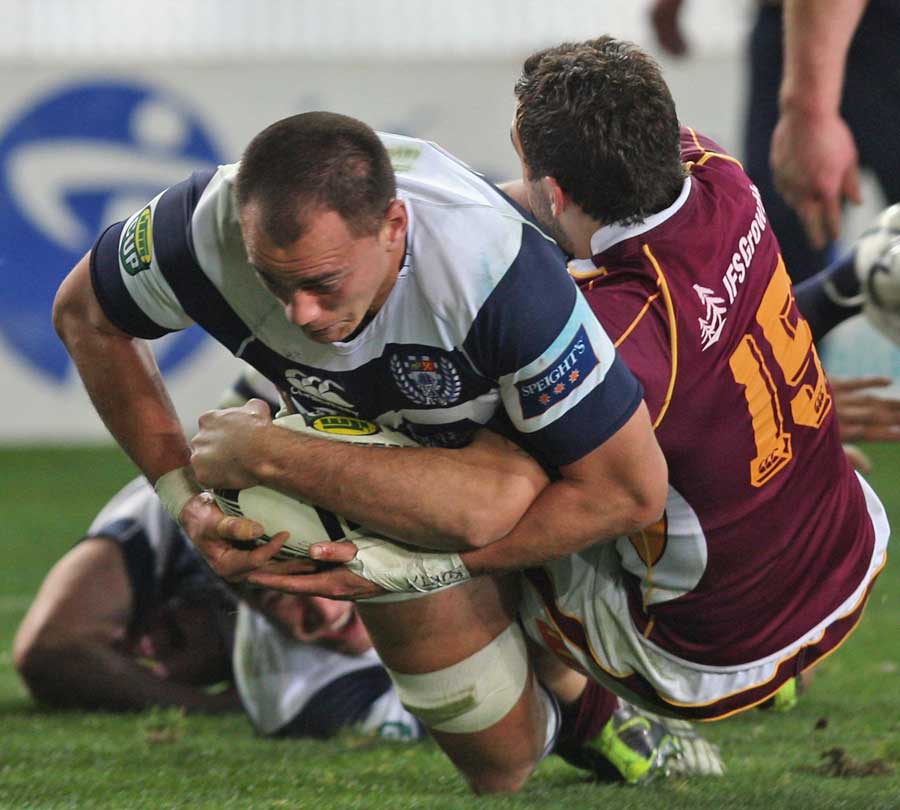 Auckland's Chris Lowrey crosses for a try
